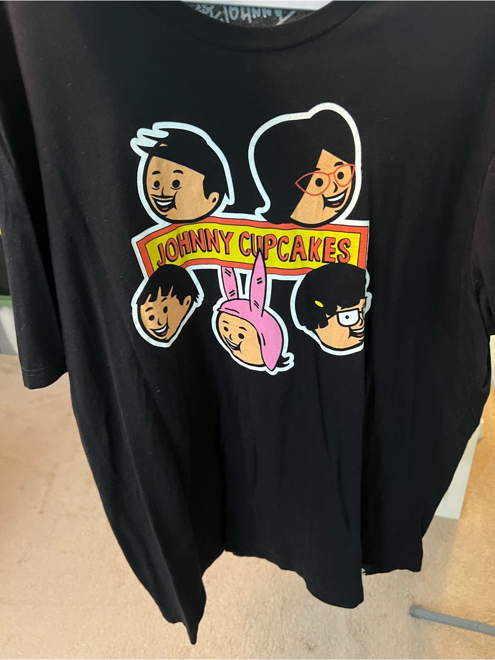 Johnny Cupcakes Black Tee with Multicolor Character Graphic